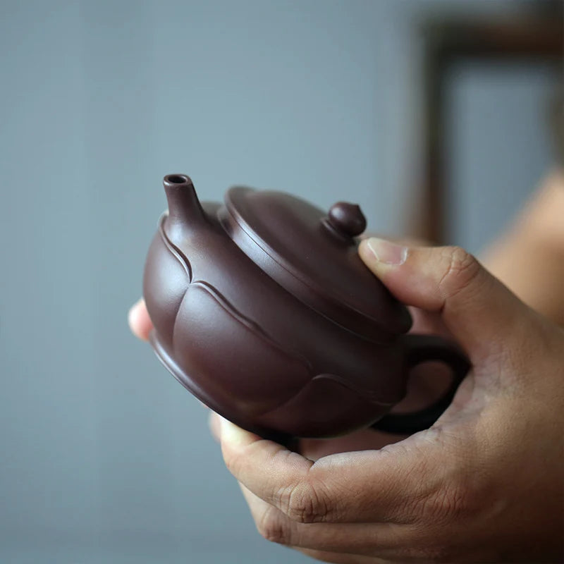 Yixing raw ore pure handmade purple clay pot old purple clay caltrop pot 210cc lotus petals elegant and ancient