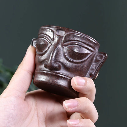 Zanghutianxia Purple Sand Tea Cup Sanxingdui Mask Creative Creative Master Cup Kung Fu Tea Cup Tea Cup Boccaro Cup Tea Cup