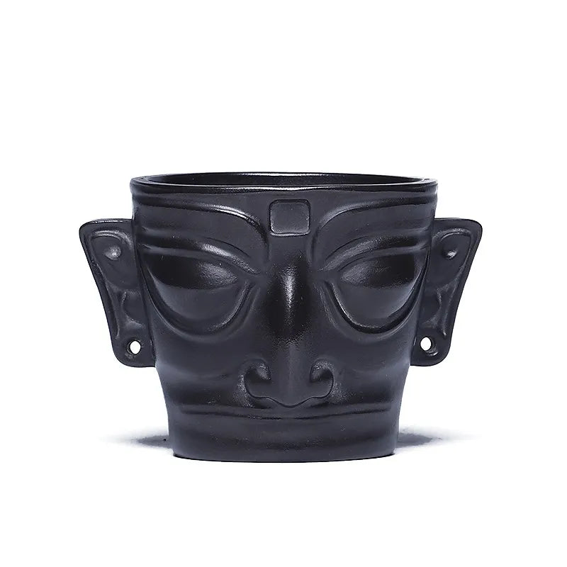 Zanghutianxia Purple Sand Tea Cup Sanxingdui Mask Creative Creative Master Cup Kung Fu Tea Cup Tea Cup Boccaro Cup Tea Cup