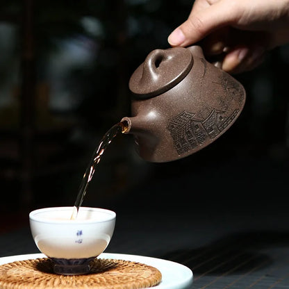 Zanghutianxia Yixing Original Yixing Clay Teapot Handmade Double-Sided Carving Overlord Shipiao Teapot Household Teapot Jiangnan