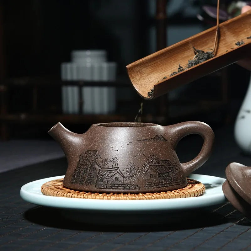 Zanghutianxia Yixing Original Yixing Clay Teapot Handmade Double-Sided Carving Overlord Shipiao Teapot Household Teapot Jiangnan