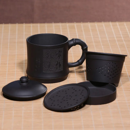 Zhenyi Yixing Zisha Cup is hand-made with inner liner, filter cover, tea cup and black mud engraving