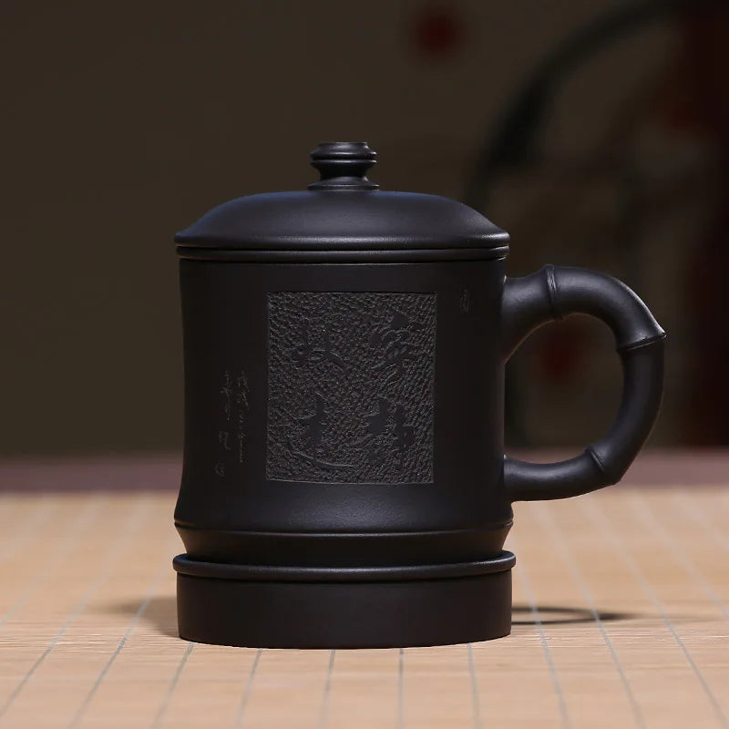 Zhenyi Yixing Zisha Cup is hand-made with inner liner, filter cover, tea cup and black mud engraving