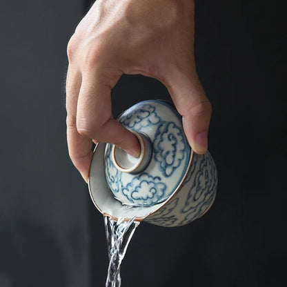at the beginning of the jingdezhen ceramic tureen pure manual blue-and-white tureen xiangyun cup cup kung fu tea set