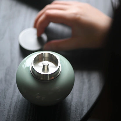 at the beginning of the jingdezhen pea green glaze tin lid caddy ceramic seal tank portable moisture storage mini POTS