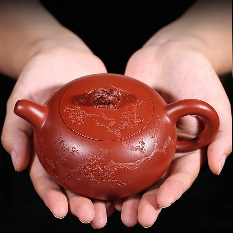 ball shaped infuser holes handmade tea pot marked tree embossed mascot statue on lid marked master pot 230ml hand carved new