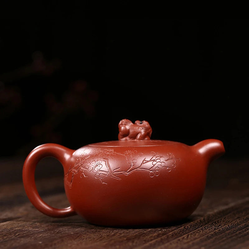 ball shaped infuser holes handmade tea pot marked tree embossed mascot statue on lid marked master pot 230ml hand carved new