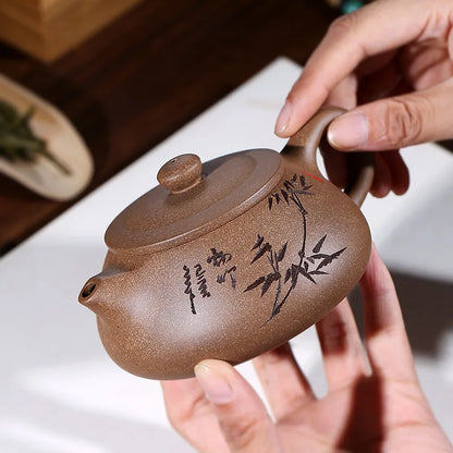 bamboo carved tea pot authentic yixing zisha qinghui clay marked pot handmade craft 9 infuser holes on sales in China