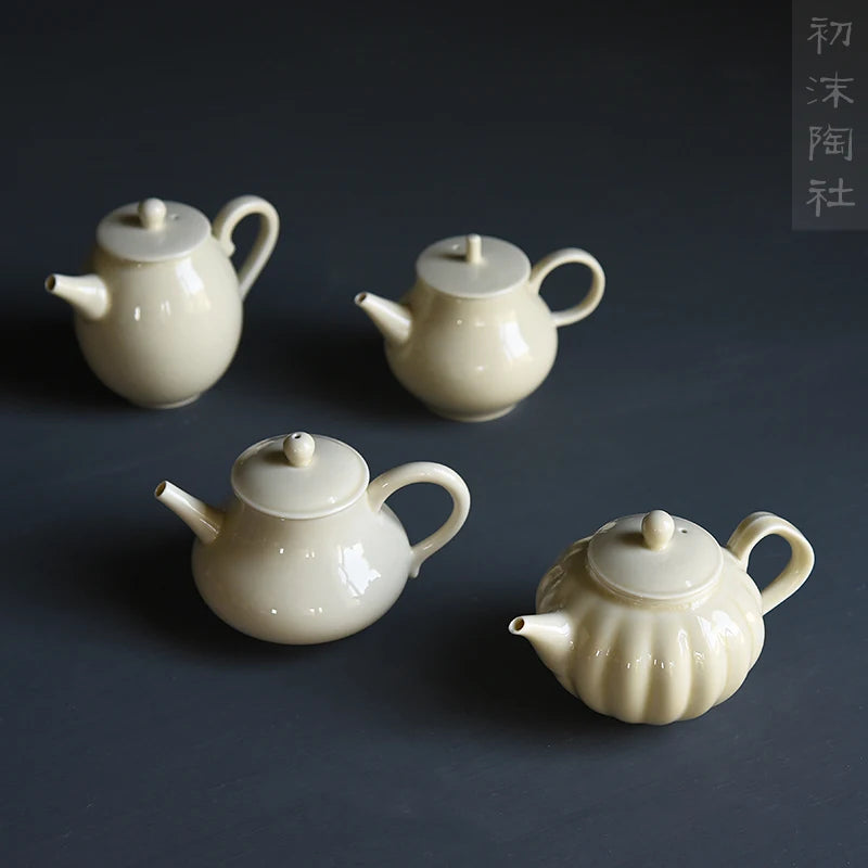 beginning of the foam ceramic teapot single filtering teapot yellow glaze glaze small household teapot kung fu tea pot