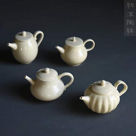 beginning of the foam ceramic teapot single filtering teapot yellow glaze glaze small household teapot kung fu tea pot