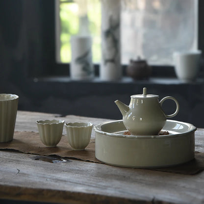 beginning of the foam ceramic teapot single filtering teapot yellow glaze glaze small household teapot kung fu tea pot