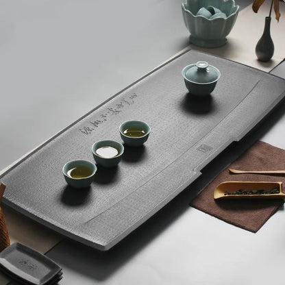 engraved Chinese words weighted black stone tea table water draining copper outlet pipe heavy tea boat 25kg for kungfu tea set