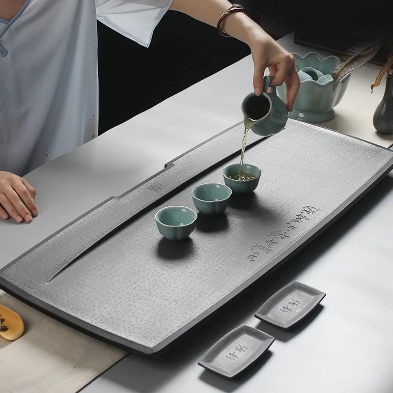 engraved Chinese words weighted black stone tea table water draining copper outlet pipe heavy tea boat 25kg for kungfu tea set