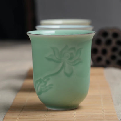 longquan celadon porcelain tea cup master carved lotus water lily engraved ceramic coffee cup one piece porcelain cups 130ml