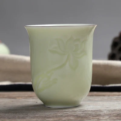 longquan celadon porcelain tea cup master carved lotus water lily engraved ceramic coffee cup one piece porcelain cups 130ml