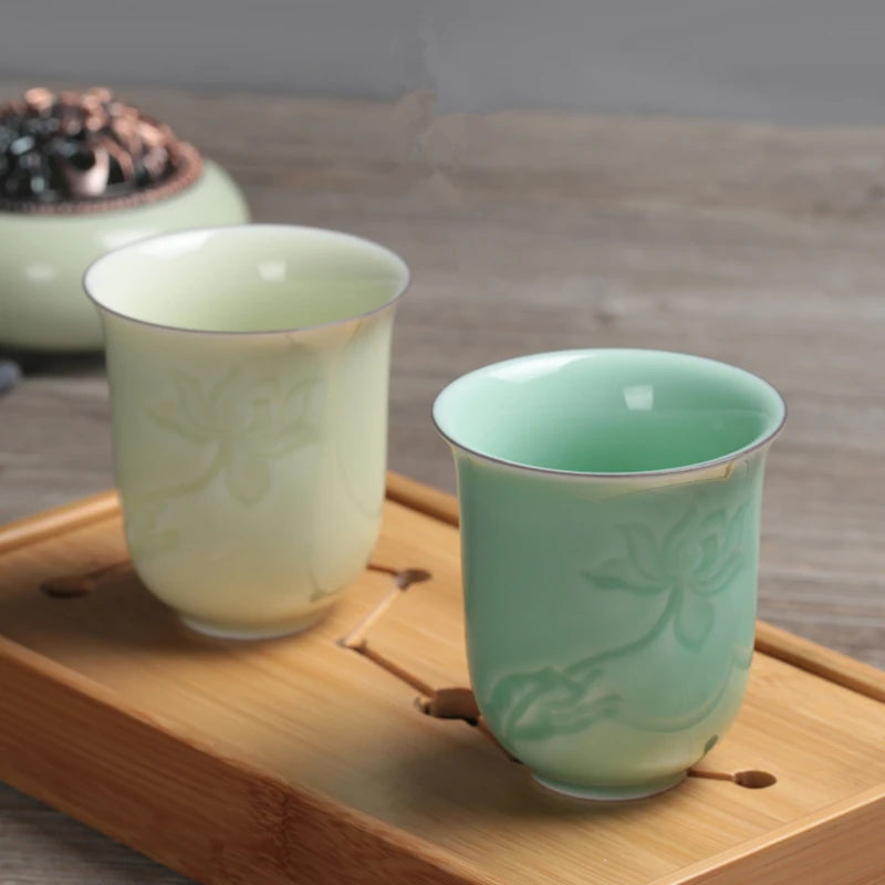 longquan celadon porcelain tea cup master carved lotus water lily engraved ceramic coffee cup one piece porcelain cups 130ml
