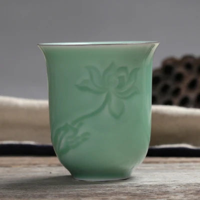 longquan celadon porcelain tea cup master carved lotus water lily engraved ceramic coffee cup one piece porcelain cups 130ml