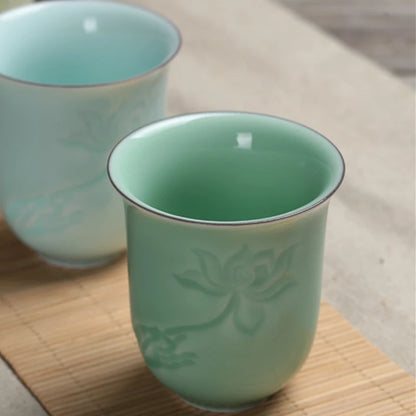 longquan celadon porcelain tea cup master carved lotus water lily engraved ceramic coffee cup one piece porcelain cups 130ml