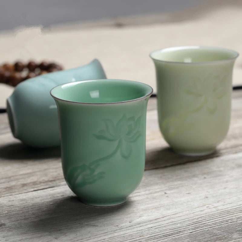 longquan celadon porcelain tea cup master carved lotus water lily engraved ceramic coffee cup one piece porcelain cups 130ml