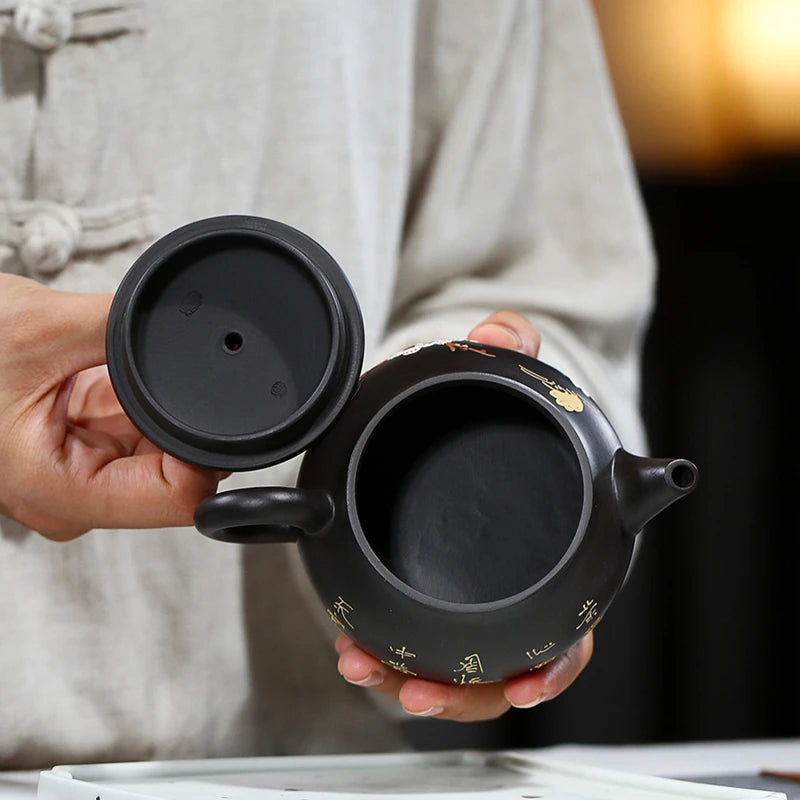 marked tea pot handmade master pot real yixing zisha black clay original ore purple grit floral relief kungfu tea pots in China
