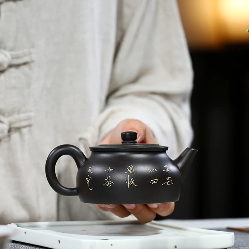 marked tea pot handmade master pot real yixing zisha black clay original ore purple grit floral relief kungfu tea pots in China