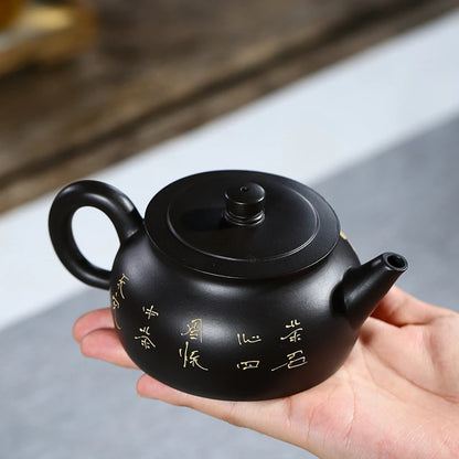 marked tea pot handmade master pot real yixing zisha black clay original ore purple grit floral relief kungfu tea pots in China