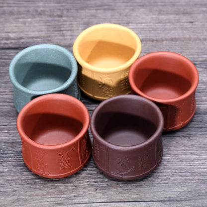 on big sales Chinese real yixing zisha tea cup floral character relief kungfu cup purple grit cup for Pu'er tea green tea marked