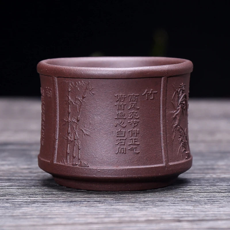 on big sales Chinese real yixing zisha tea cup floral character relief kungfu cup purple grit cup for Pu'er tea green tea marked