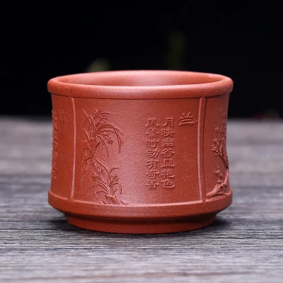 on big sales Chinese real yixing zisha tea cup floral character relief kungfu cup purple grit cup for Pu'er tea green tea marked