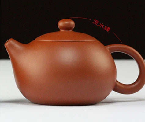 on sales Chinese kungfu tea pot small size yixing purple clay pot ball infuse holes China tea brewer pot of tea fast shipment