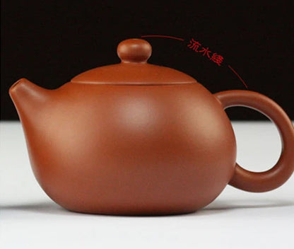 on sales Chinese kungfu tea pot small size yixing purple clay pot ball infuse holes China tea brewer pot of tea fast shipment