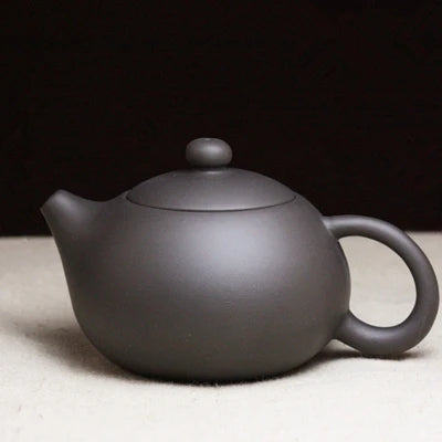 on sales Chinese kungfu tea pot small size yixing purple clay pot ball infuse holes China tea brewer pot of tea fast shipment