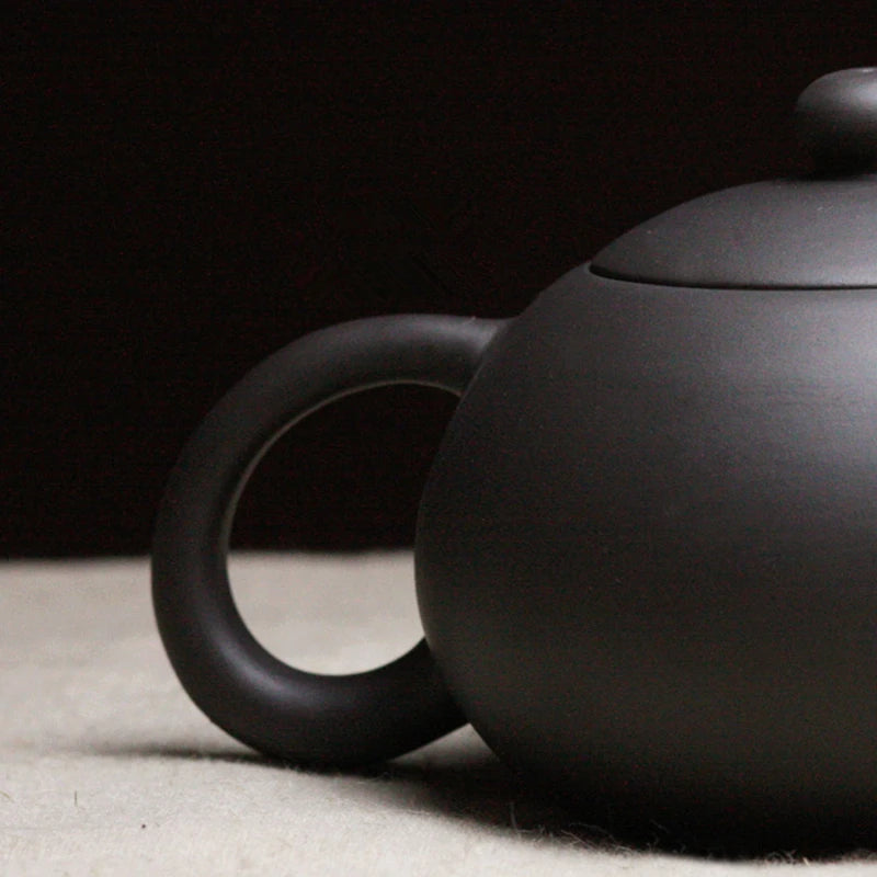 on sales Chinese kungfu tea pot small size yixing purple clay pot ball infuse holes China tea brewer pot of tea fast shipment