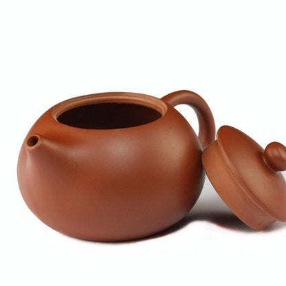 on sales Chinese kungfu tea pot small size yixing purple clay pot ball infuse holes China tea brewer pot of tea fast shipment