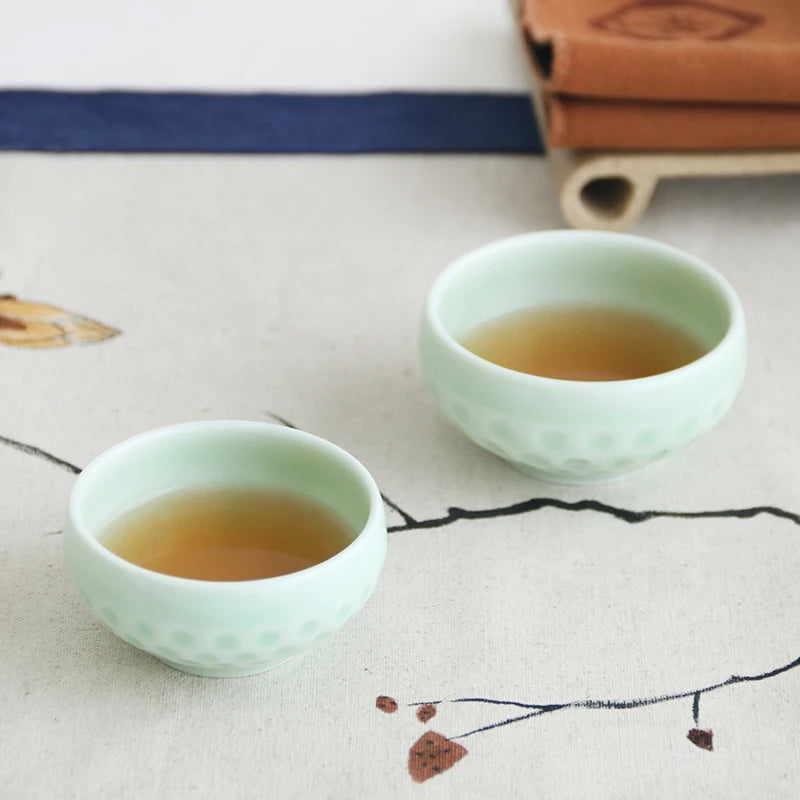 one cup porcelain longquan celadon Chinese kungfu tea cup creative lotus flower relief cup for Pu'er tea 50ml master cup of tea