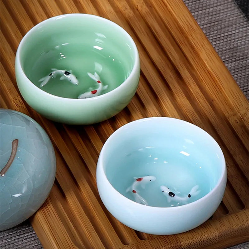 one tea cup longquan celadon porcelain fish relief carved kungfu cup of tea geyao crackle glaze master cup diyao craft in China