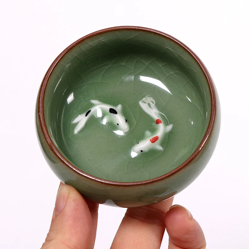 one tea cup longquan celadon porcelain fish relief carved kungfu cup of tea geyao crackle glaze master cup diyao craft in China