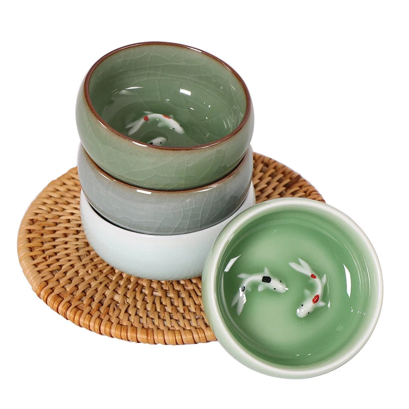 one tea cup longquan celadon porcelain fish relief carved kungfu cup of tea geyao crackle glaze master cup diyao craft in China
