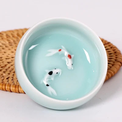 one tea cup longquan celadon porcelain fish relief carved kungfu cup of tea geyao crackle glaze master cup diyao craft in China