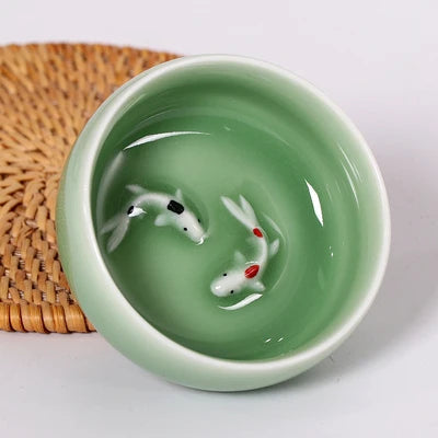 one tea cup longquan celadon porcelain fish relief carved kungfu cup of tea geyao crackle glaze master cup diyao craft in China