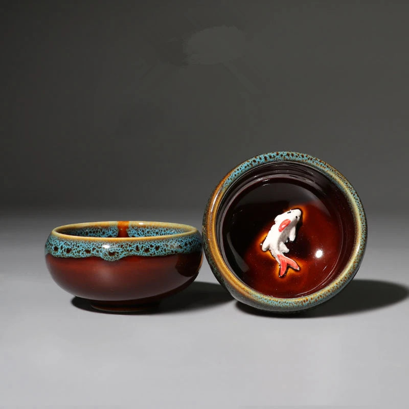 one tea cup on sales kiln change creative glaze porcelain cup fish relief Chinese kungfu cup of tea 50ml for Pu'er Chinese cups