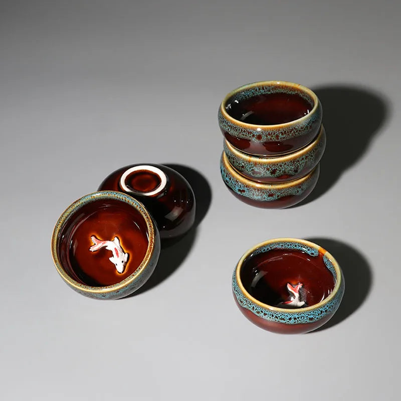 one tea cup on sales kiln change creative glaze porcelain cup fish relief Chinese kungfu cup of tea 50ml for Pu'er Chinese cups