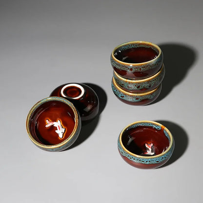 one tea cup on sales kiln change creative glaze porcelain cup fish relief Chinese kungfu cup of tea 50ml for Pu'er Chinese cups