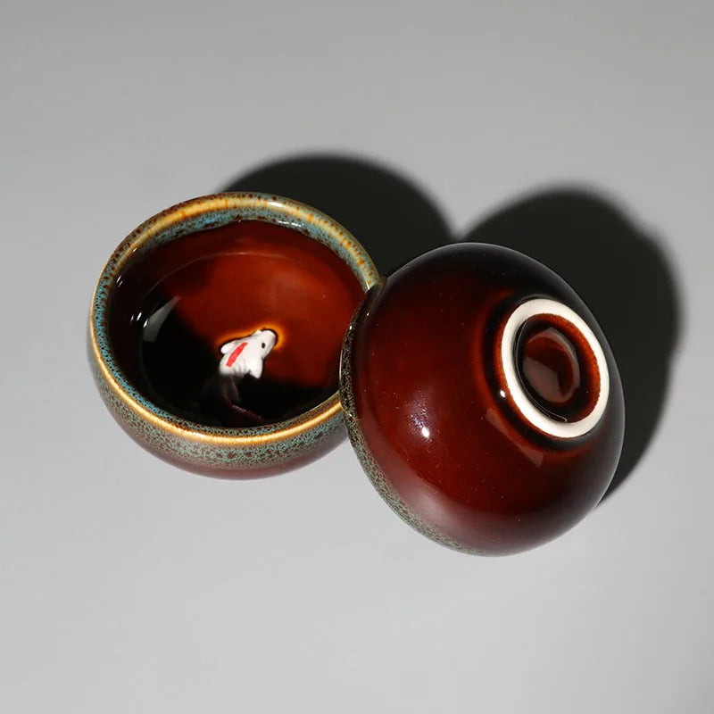 one tea cup on sales kiln change creative glaze porcelain cup fish relief Chinese kungfu cup of tea 50ml for Pu'er Chinese cups