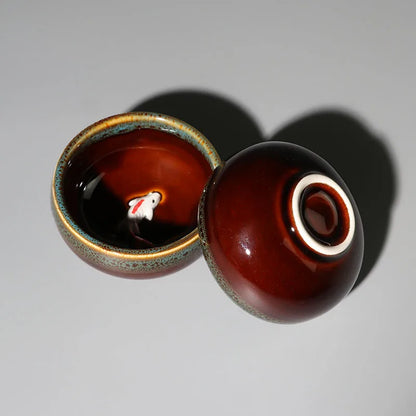 one tea cup on sales kiln change creative glaze porcelain cup fish relief Chinese kungfu cup of tea 50ml for Pu'er Chinese cups