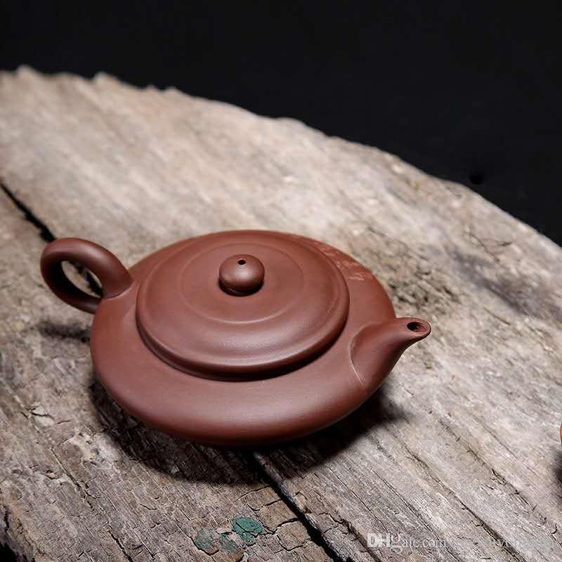 Wholesale Puyuhun gold teapot manufacturer customized large-sized water-deficient flat teapot