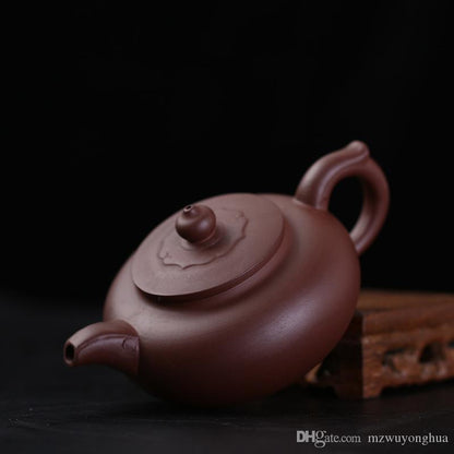 Traditional Chinese Tea pot Purple clay pot manufacturer first-hand supply special wholesale Ruyi pot in 240 ml Kungfu teapot