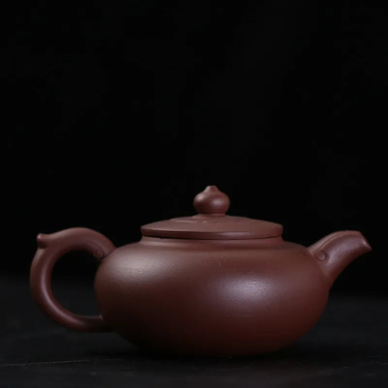 Traditional Chinese Tea pot Purple clay pot manufacturer first-hand supply special wholesale Ruyi pot in 240 ml Kungfu teapot