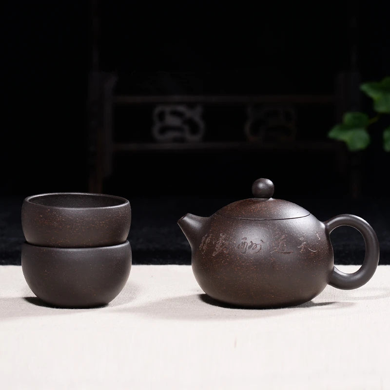 real yixing zisha tea pot + 2 tea cups marked xishi pot handmade carved Chinese characters ball-shaped infuser holes pot of tea