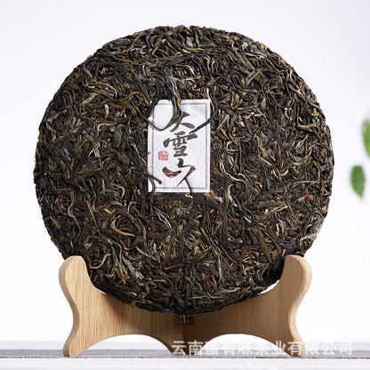 357g/12.59oz Pu'er Tea Da Xueshan Early Spring Ancient Raw Tea Seven Seed Cake